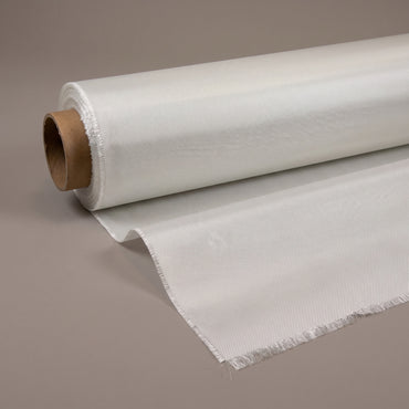 Roll of 4 oz S-2 glass cloth part unrolled on a cardboard core