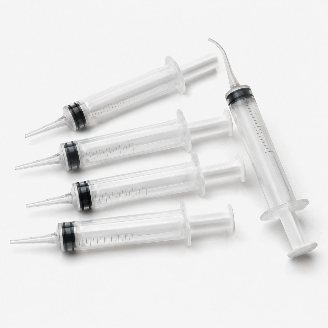 Clear graduated plastic dispensing syringes with taper tips for measuring and injecting epoxy, hardener and pigment