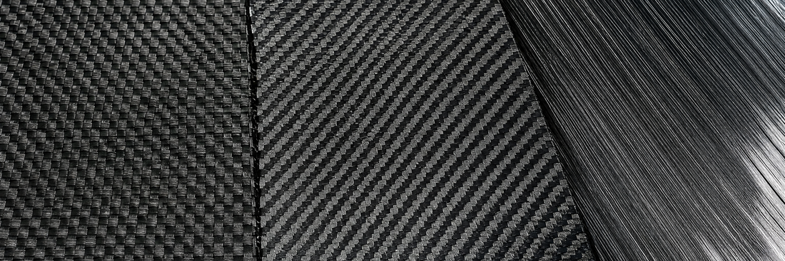 Three carbon fiber samples left to right: plain weave checkerboard, diagonal twill weave, and unidirectional strands all running one way