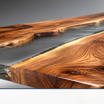 A live edge wooden river table finished with crystal clear epoxy resin