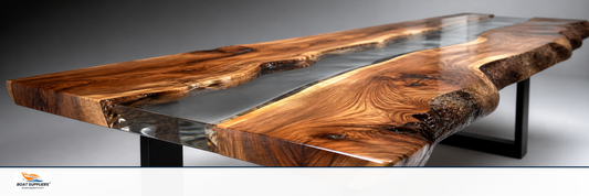 A live edge wooden river table finished with crystal clear epoxy resin