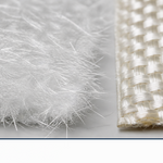 Chopped strand mat and woven roving fiberglass materials side by side