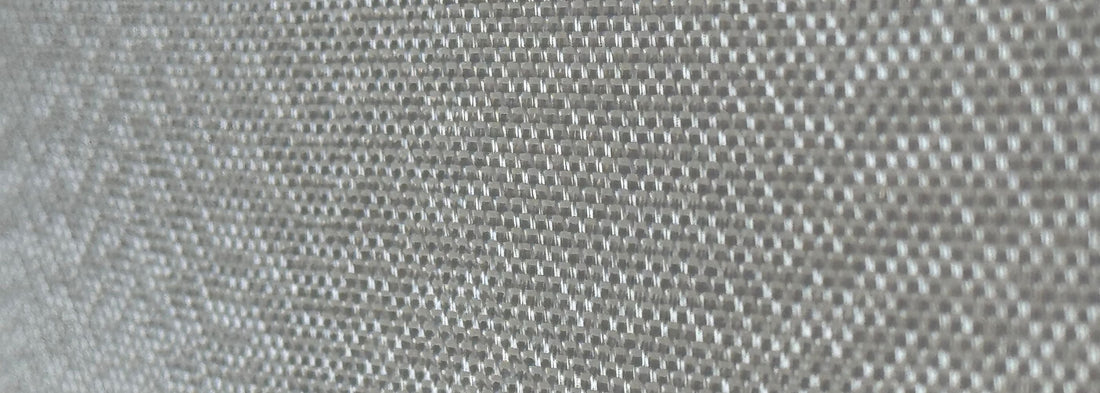 Close-up of plain and twill fiberglass weave patterns