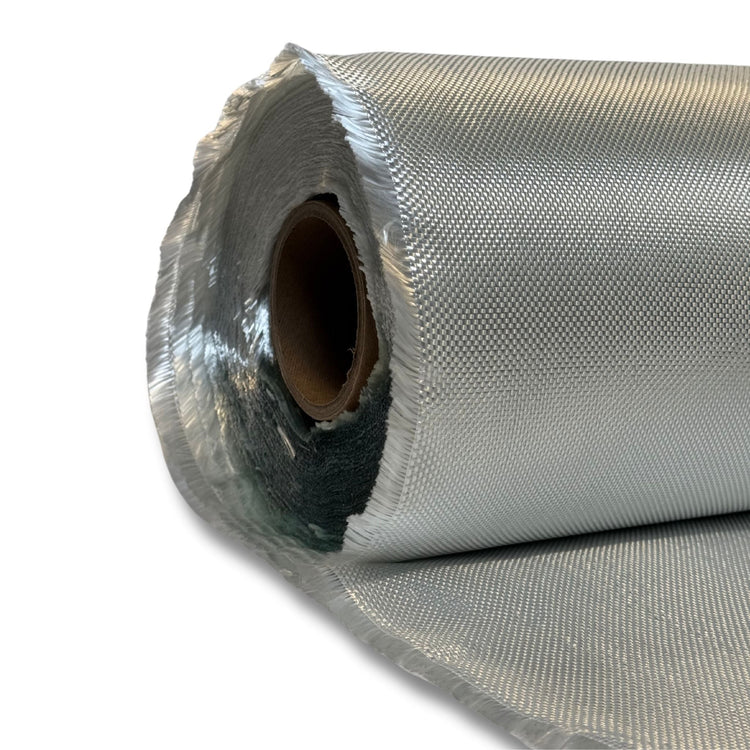 Roll of E-glass fiberglass cloth part unrolled on a cardboard core