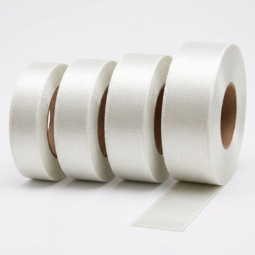 Rolls of 12 oz warp unidirectional E-glass fiberglass tape on cardboard cores