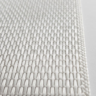Close-up of warp unidirectional fiberglass tape weave, glass strands running the length of the tape