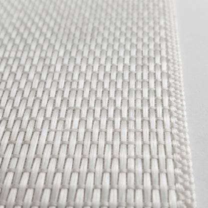 Close-up of warp unidirectional fiberglass tape weave, glass strands running the length of the tape