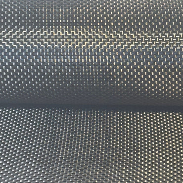 Close-up of 5.7oz 3K plain weave carbon fiber fabric showing the tight, even over-under checkerboard tow pattern.