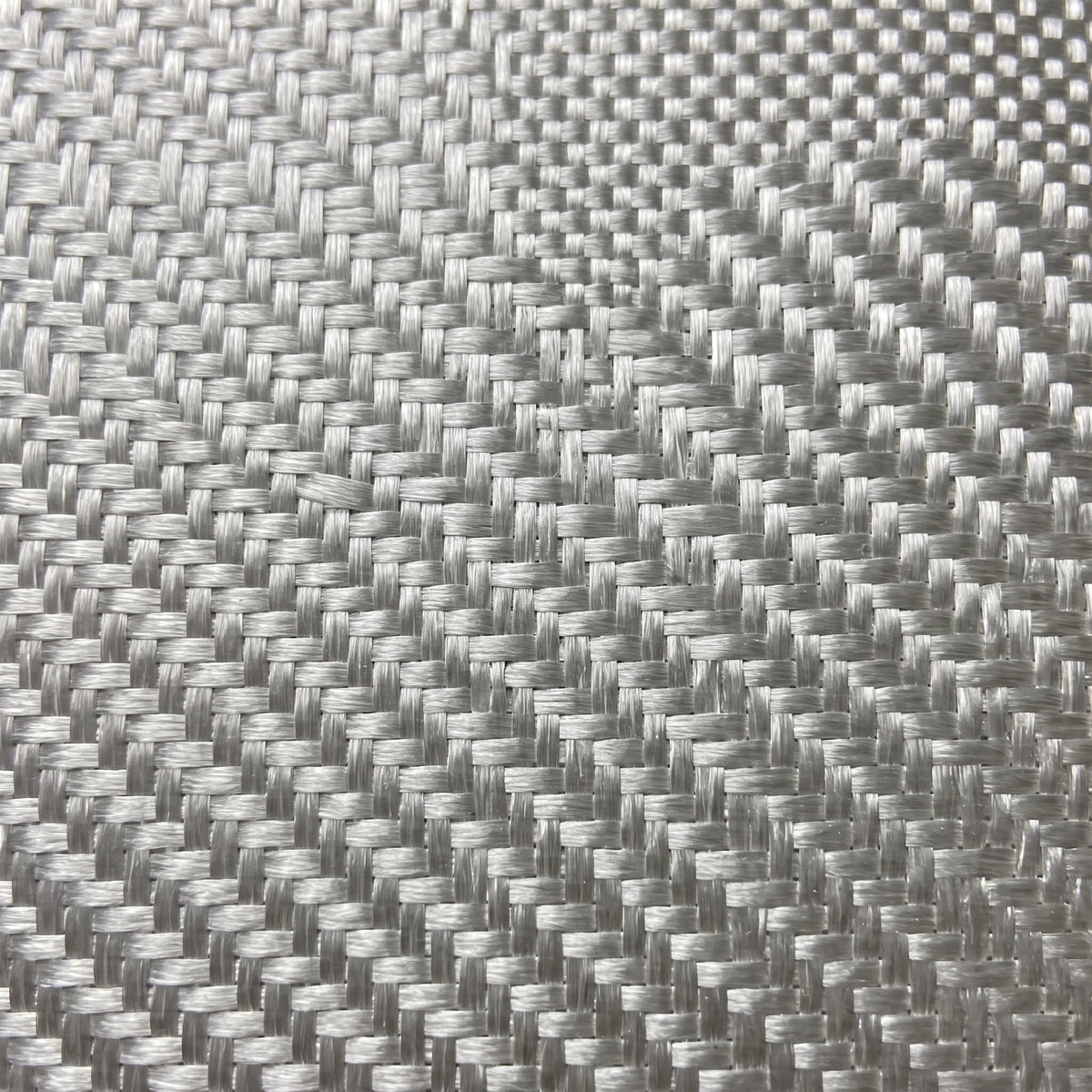 Close-up of 6 oz plain weave glass cloth, thick flat yarns crossing in an even square grid