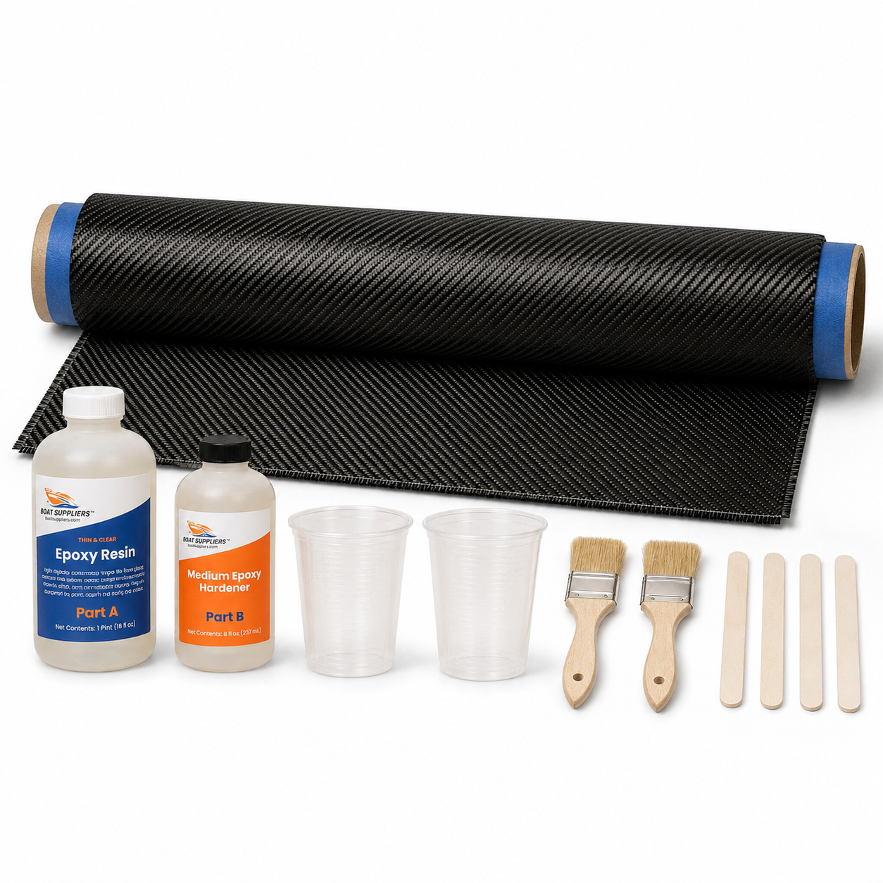 Carbon fiber skinning kit contents: wide 24 inch by 5 foot cut of 2x2 twill carbon fiber with blue taped edges rolled on a tube, Boat Suppliers two-part epoxy resin and hardener bottles, graduated mixing cups, chip brushes and stir sticks