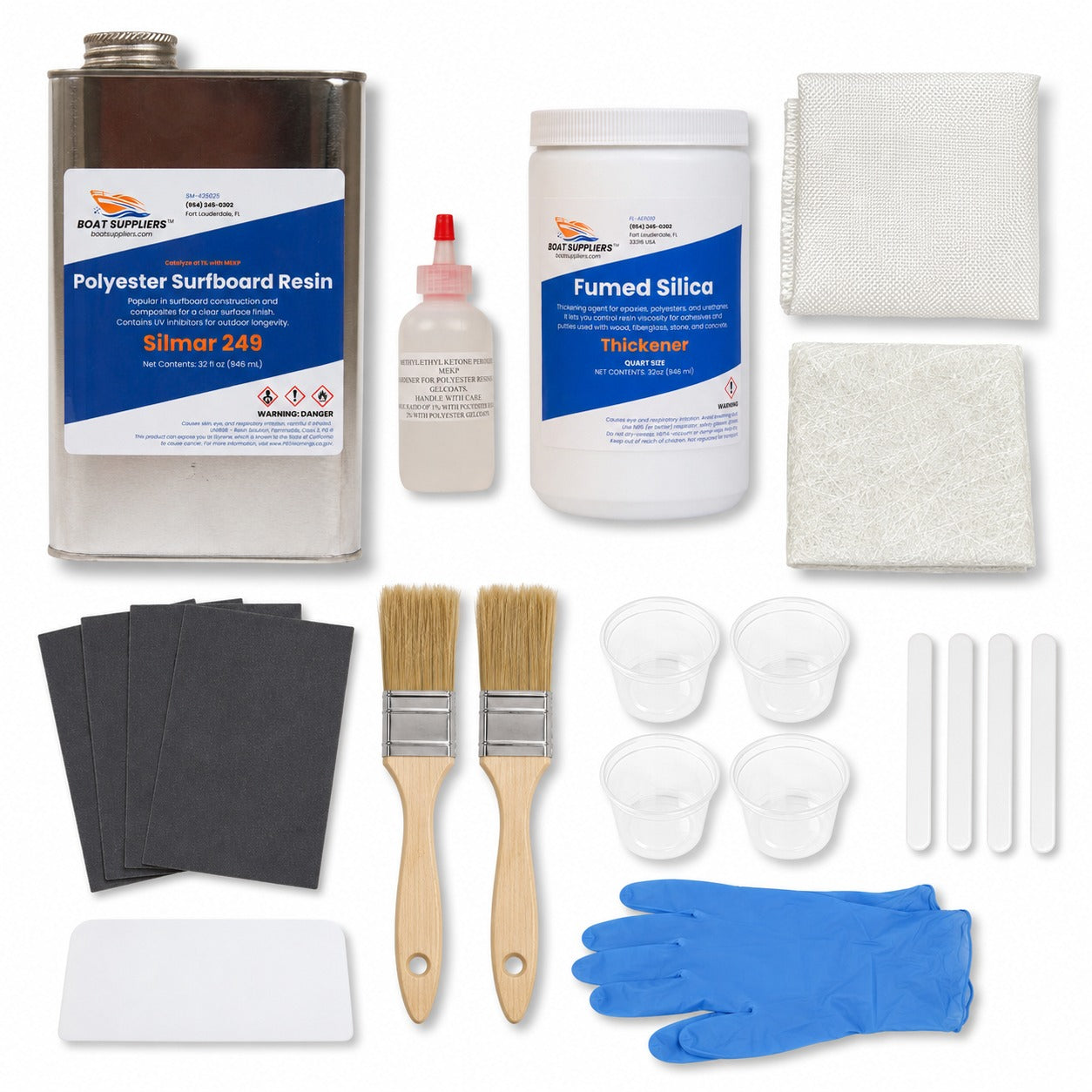 Complete fiberglass repair kit contents: quart of Boat Suppliers Silmar 249 polyester resin with MEKP hardener, fiberglass cloth, chopped strand mat, fumed silica, sandpaper, brushes, mixing cups, sticks, spreader and gloves