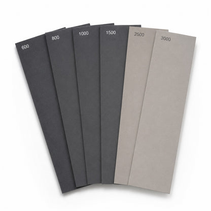 Finish and polish wet dry sandpaper pack, six sheets fanned showing 600 to 3000 grit