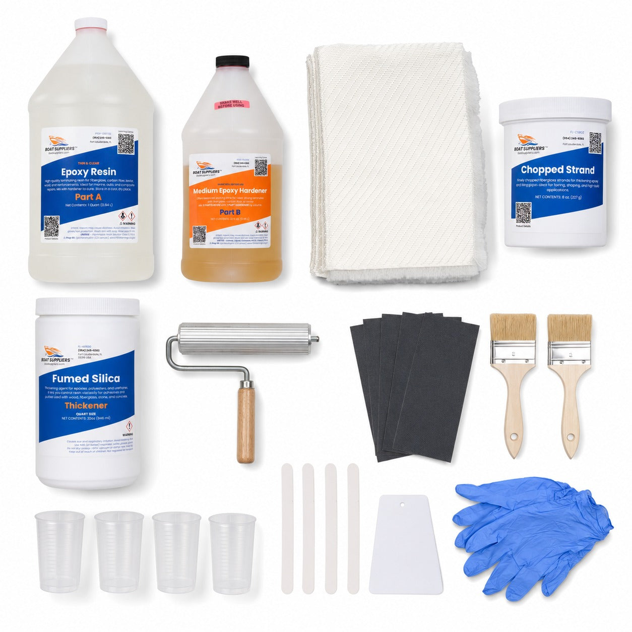 Transom repair kit contents: quart epoxy resin kit with medium hardener, 3 yards of 1708 biaxial fiberglass, chopped strand fibers, fumed silica, laminating roller, sandpaper, brushes, mixing cups, sticks, spreader and gloves