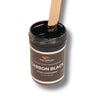 Stir stick lifting Carbon Black liquid pigment from the open 1 oz jar, opaque black colorant for epoxy resin, gelcoat, and resin art.