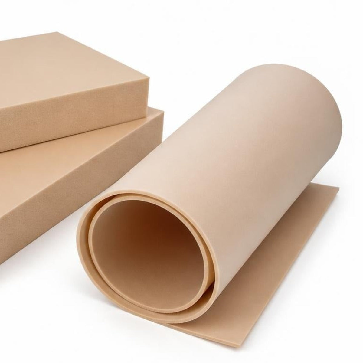 Thin plain PVC foam core sheet loosely rolled beside thicker rigid plain foam panels.