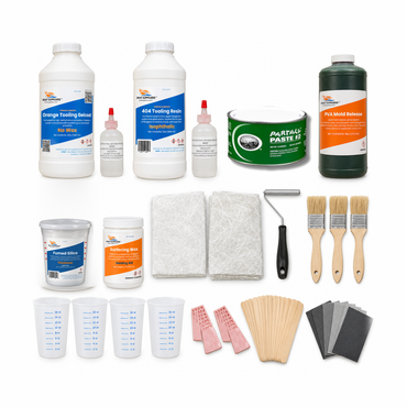 Small parts fiberglass mold making kit contents: orange tooling gelcoat and 404 isophthalic tooling resin quarts with MEKP, Partall #2 paste wax, PVA mold release, fumed silica, surfacing wax, veil and chopped strand mat, roller, chip brushes, pint mixing tubs, release wedges, mixing sticks and sandpaper