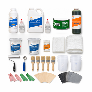 Standard fiberglass mold making kit contents: orange tooling gelcoat quart and 404 isophthalic tooling resin gallon with MEKP, Partall #2 paste wax, PVA mold release, chopped strand, fumed silica, surfacing wax, veil and chopped strand mat, two rollers, chip brushes, pint mixing tubs, release wedges, mixing sticks and sandpaper