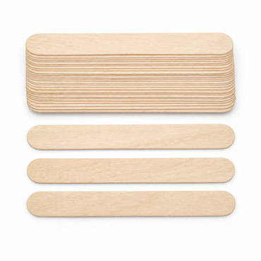 Stack of wooden tongue depressor stir sticks with three loose sticks