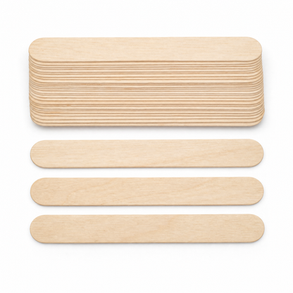 Stack of wooden tongue depressor stir sticks with three loose sticks